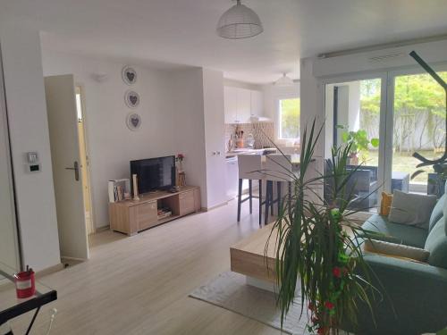 La Grace de Dieu Sud Apartment | Le Cosy avec jardin terrasse couverte et parking gratuit