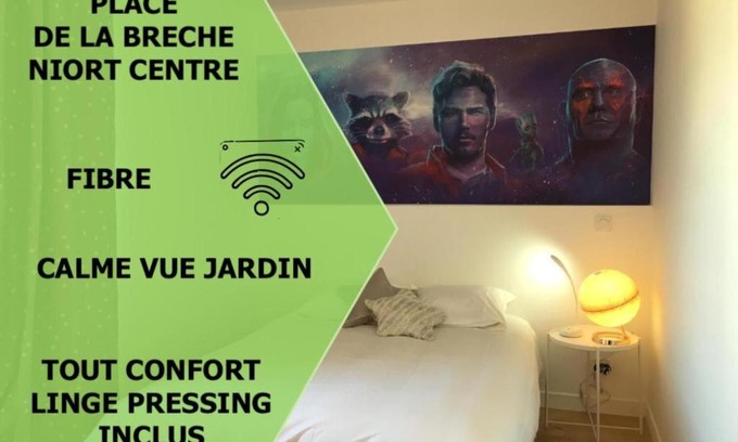 Centre Ville Apartment | Le Galaxy centre la Brèche wifi calme vue jardin