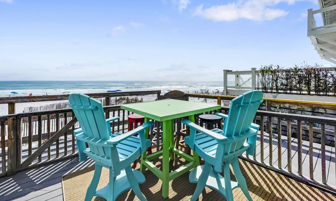 SeaNest Village Condo | "Leeward II-3" | Beachfront Condo | Large first level deck with steps down to sand