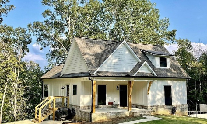 Crane Hill House | Lewis Smith Lake Waterfront Home with 2 Story Dock/Hot Tub