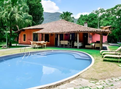 Centro Comercial House | Linda casa em Ilha Bela