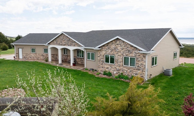 Chamberlain House | Location Location Location! On a river view acreage, sleeps up to 14, pets ok.