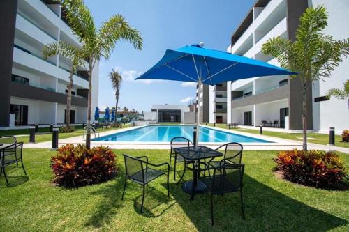 Villa Marina Apartment | Loft de lujo con 9 albercas y vistas al campo de golf