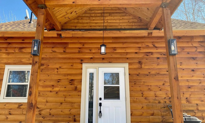 Wentworth Ski Chalet | Log Cabin across from ski Wentworth, with outdoor fire pit and BBQ