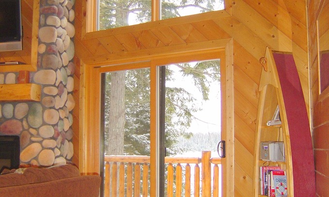Land O Lakes Ski Chalet | Log chalet executive lodge - wrap around deck lakeside & gazebo on 26 acres