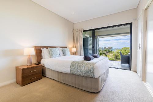 Agnes Water Apartment | Loka Santi 14 - Gorgeous Beachfront Penthouse with Sea Views & Heated Communal Pool in Sunny Agnes Water