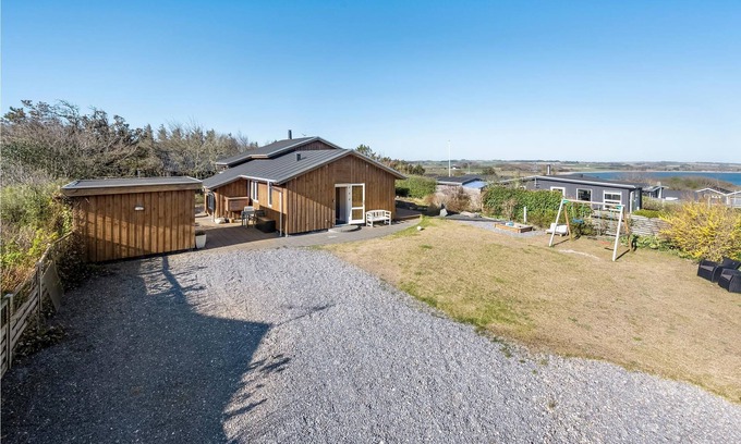 Remmer Strand House | Look forward to a relaxing vacation in this beautiful vacation home by the Limfjord.