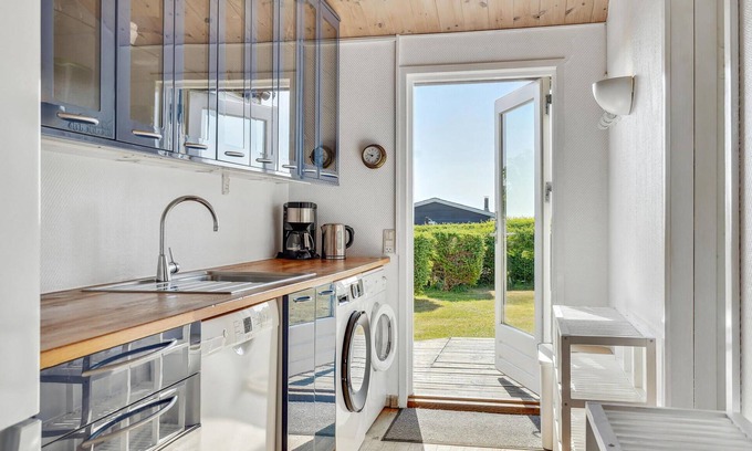 Frørup House | Look forward to a wonderful vacation with sea view in this vacation home.