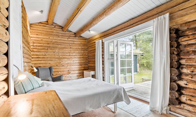 Melby House | Look forward to this charming vacation home in a peaceful setting.