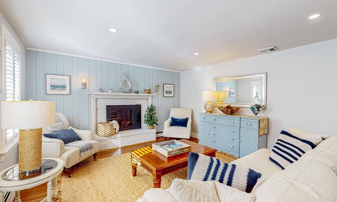 Cotuit House | Lovell's Pond Retreat - remodeled home with sunroom, steps to secluded pond