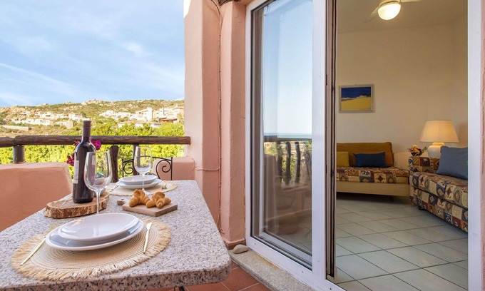 Canneddi Apartment | Lovely apartment for 4 people with A/C, pool, WIFI, TV, terrace, pets allowed and parking