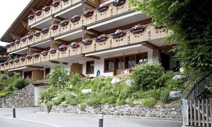Gstaad Apartment | Lovely apartment for 4 guests with WIFI, TV and balcony