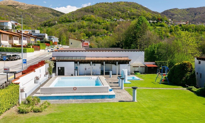 Sonvico Apartment | Lovely apartment for 5 people with pool, WIFI, TV, patio, pets allowed, panoramic view and parking