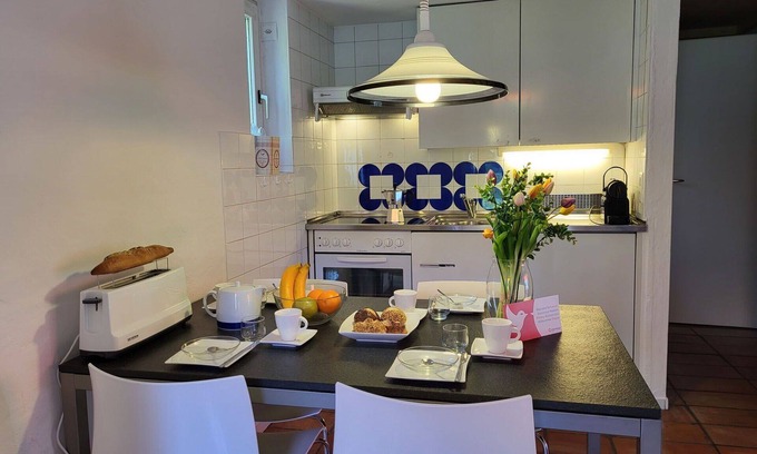 Capriasca Apartment | Lovely apartment for 5 guests with WIFI, pool, TV, patio, pets allowed and parking