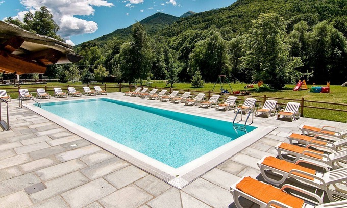 Sampeyre Apartment | Lovely apartment for 4 guests with WIFI, pool, TV, terrace and parking