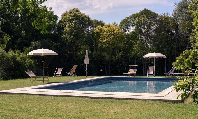 Asciano Villa | Lovely apartment in villa for 2 guests with WIFI, A/C, pool, TV, pets allowed and parking