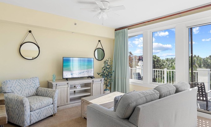 Baytowne Wharf Condo | Lovely Bay Views at Baytowne Wharf! Tropical Pool & Hot Tub, Beach Tram, Gym.