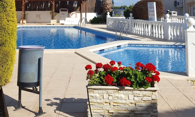 Quesada House | Lovely, Comfortable, Two Bed Town House with Stunning Community Pool. n
