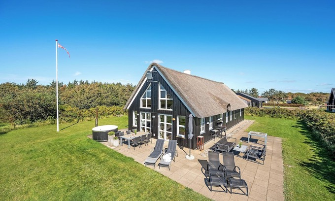 West Coast House | Lovely holiday home with fantastic views, fenced grounds, and a Wilderness bath.