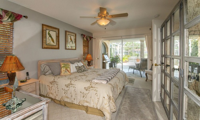 North Naples House | Lovely Naples home with pool and private boat dock, steps from Vanderbilt Beach