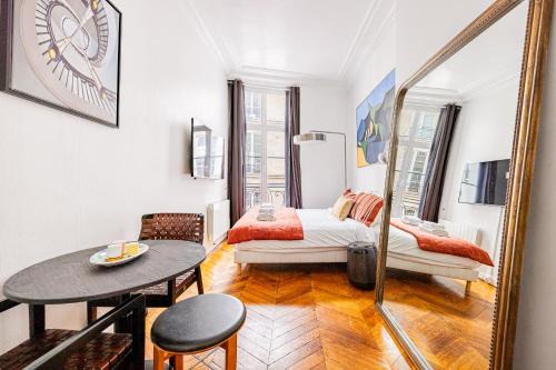 Palais-Royal Apartment | Luminous Studio Oasis Steps from The Louvre