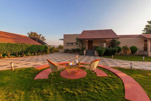 Nashik Villa | Luna Villa by StayVista - Lakeside charm with Terrace, Lush lawn & Modern decor
