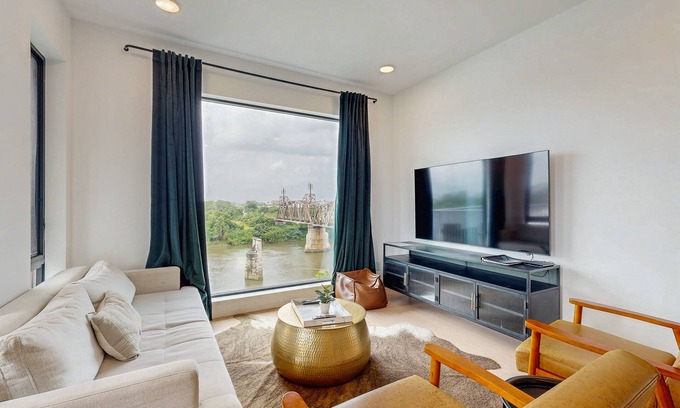 North Capitol House | Luxe downtown condo on the waterfront - river-view balcony, fast WiFi & W/D