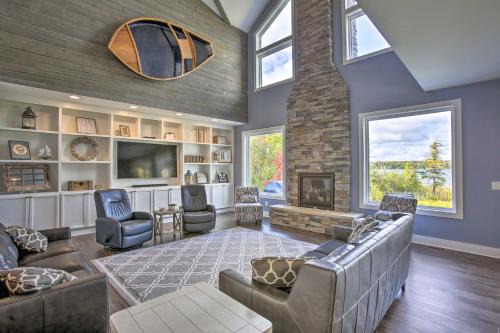 Maple City House | Luxe Lakefront Escape with 4 Kayaks, Hot Tub, Beach!