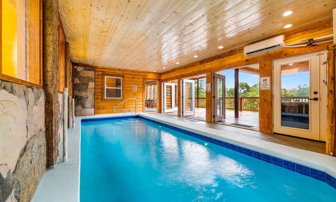 Chalet Village North Cabin | LUXURIOUS NEW CABIN- Heated Pool-Mini Golf-Sauna-View-Theater-BBQ-Great Reviews