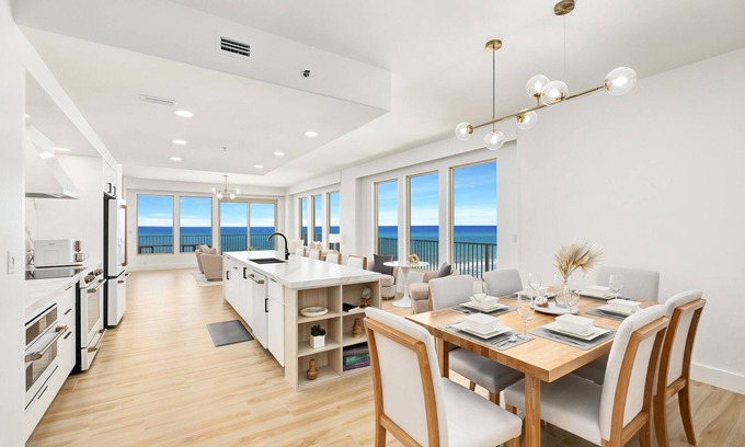 Thomas Drive Condo | Luxurious renovated Gulf-front condo with complimentary Beach Chair Service!