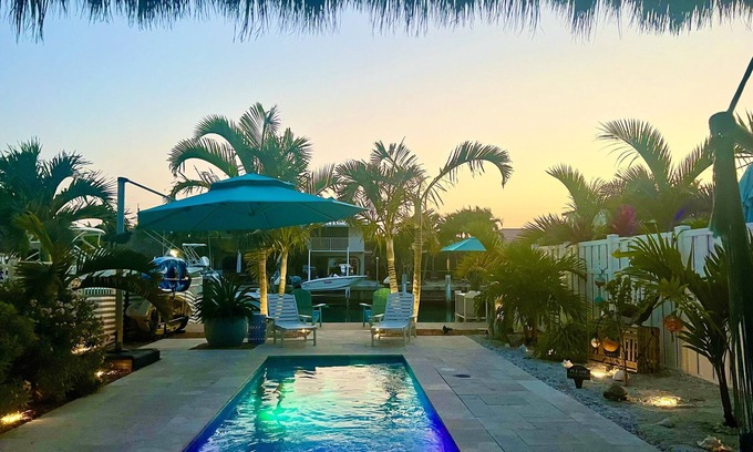 Key Colony Beach House | Luxurious Waterfront Oasis: 2BR, Private Heated Pool, Tiki, Dock