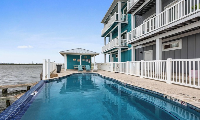 Corpus Christi House | Luxurious Waterfront Retreat with Complex Pool, Boat Slip, & Close to Beach