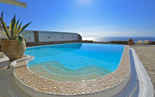 Kea Villa | Luxurious waterfront villa Christina in the area of Melissaki with a swimming pool, sea and sunset view