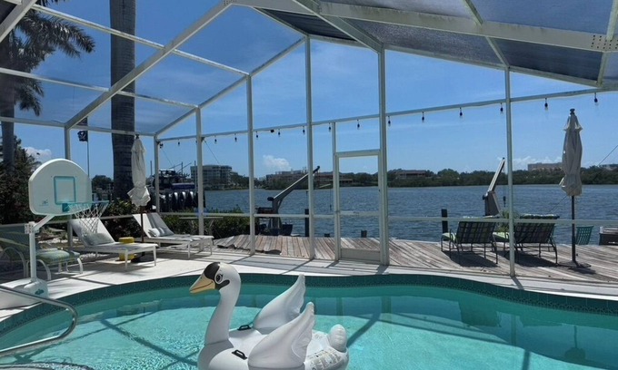 Sarasota House | Luxury 3-bedroom pool home on the scenic Intercoastal, 1 mile from beach access.