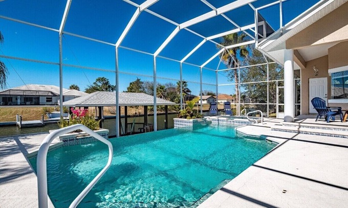 Palm Harbor House | Luxury 4-Bedroom Canal Home with Pool
