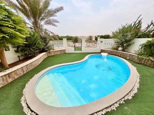 Al Hamra Village Villa | Luxury 4BHK Villa with Private Pool and Lagoon Views