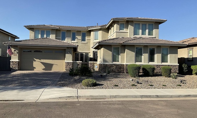 Palm Valley House | Luxury 6 Bedroom - heated pool & spa- close to stadium, golf, & more!