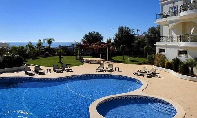 Porto de Mos Apartment | Luxury Apartment with Sea view, shared Pool and Gardens, Sleeps 6