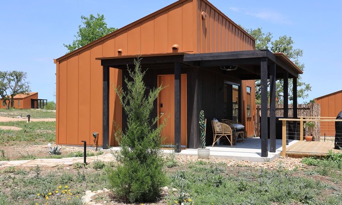 Stonewall Cabin | Luxury cabin in the center of the Texas Wine Country; large private porch w/hot tub, gas grill and fire pit; pet friendly