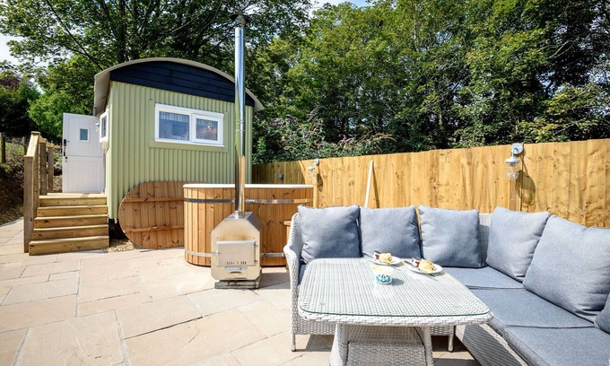Polperro Cabin | Luxury Coastal Shepherds Hut + hot tub, dining dome and outdoor kitchen.