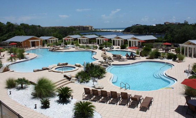 Santa Rosa Beach Condo | Luxury Condo overlooking pools, Redfish Lake, and the sparkling Gulf of Mexico