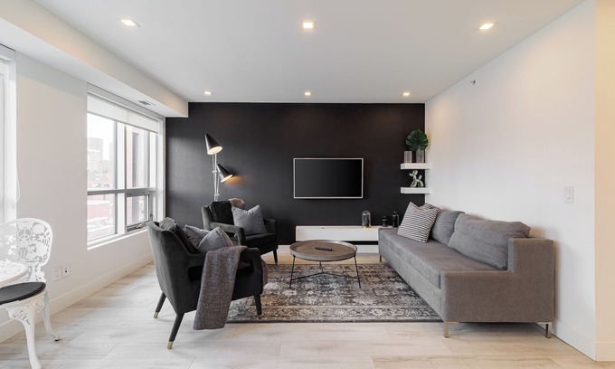 Lower Mount Royal Apartment | Luxury Downtown Suite w/Balcony Views, Air Conditioning + Free Parking