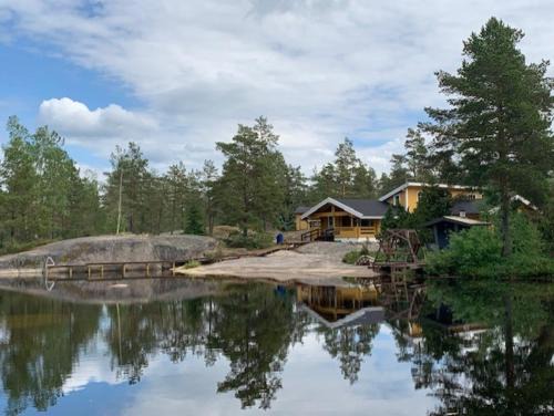 Vehmaa House | Luxury Holiday Home with Private Lake