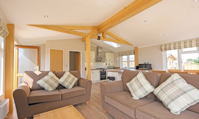 Diss Ski Chalet | Luxury lodge with one double with en suite shower and one twin.