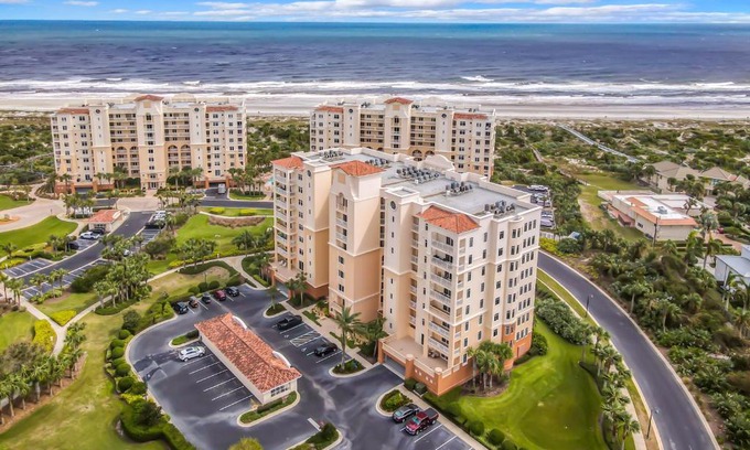 New Smyrna Beach Apartment | Luxury Minorca ~ Corner Unit ~ Ocean River Views 2 Balconies Paros 606