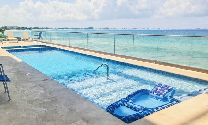 Northwest Point Condo | Luxury Ocean front SeaDreams 2 with 7 Mile Beach Views, rooftop, pool, Spa