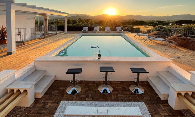 Tanaunella Villa | Luxury retreat 300 metres from the sea, with heated pool, fireplace and sauna.