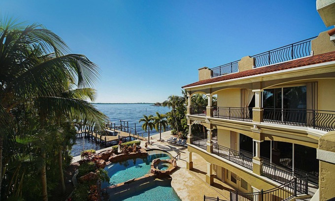 Yacht Club House | Luxury riverfront 3-story home w/bar, gym, and heated pool - The Winslet Estate