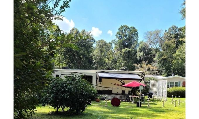 Fort White House | Luxury RV on private lot. Peaceful and charming.