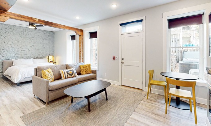 Eureka Springs Historic District House | Luxury suites near downtown with hot tub, firepit, balcony, central AC & fireplace